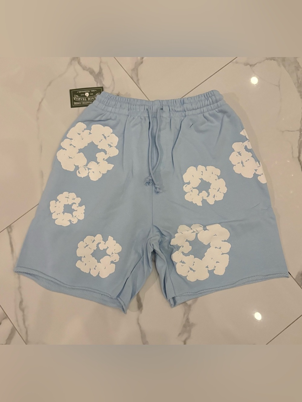 READ DESCRIPTION Light blue denim tear shorts